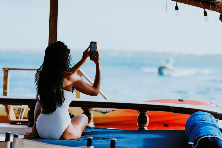 a group of people on a boat in the water