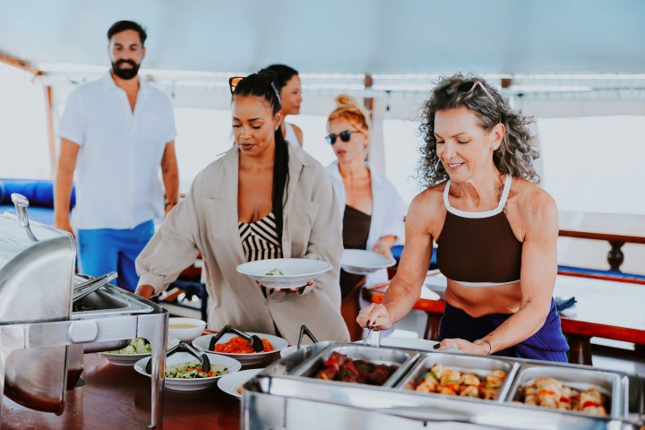 a group of people performing on a counter