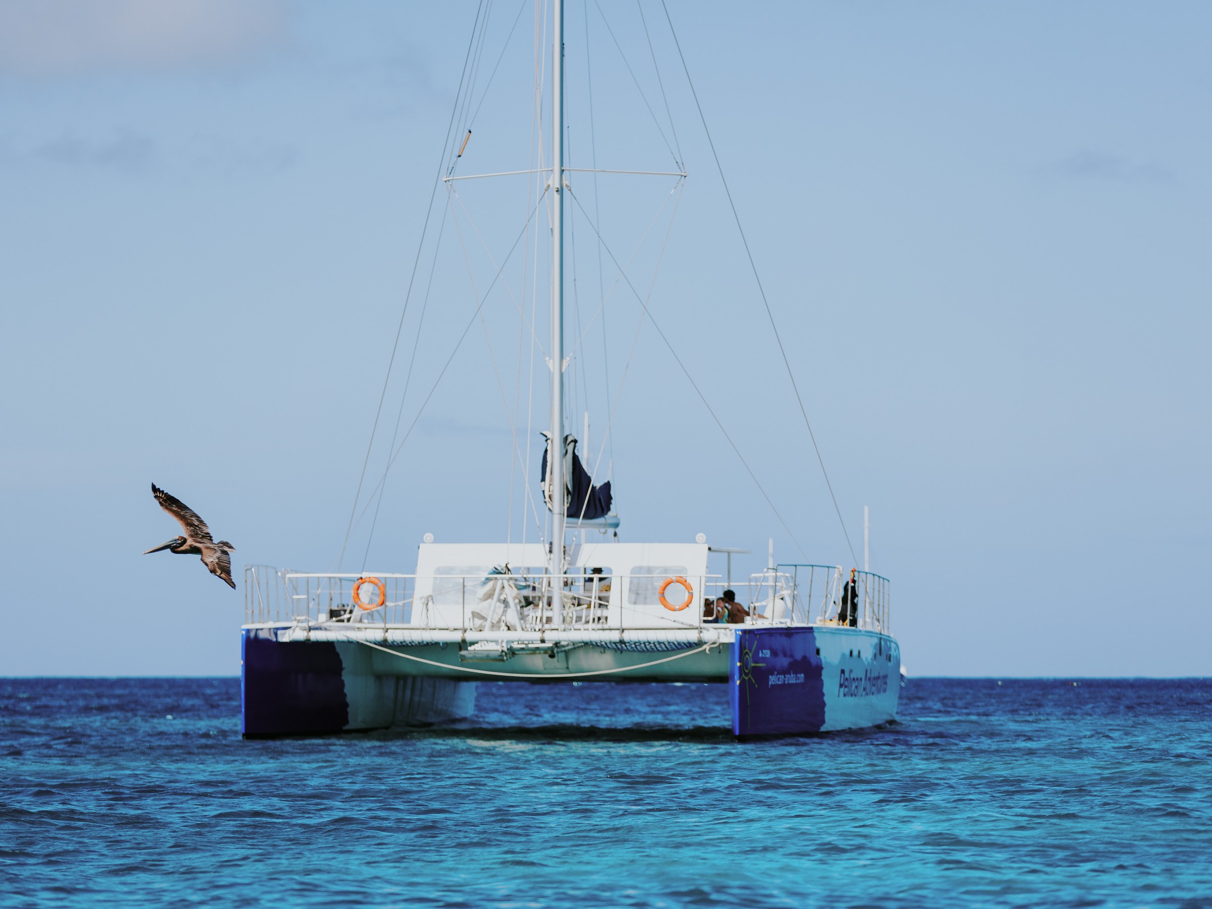 a small boat in a large body of water