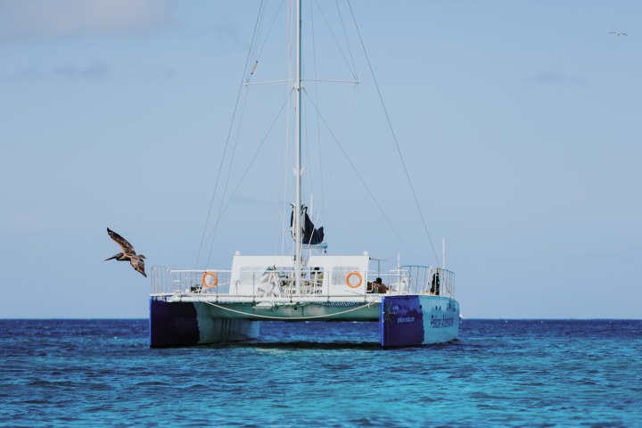 a small boat in a large body of water