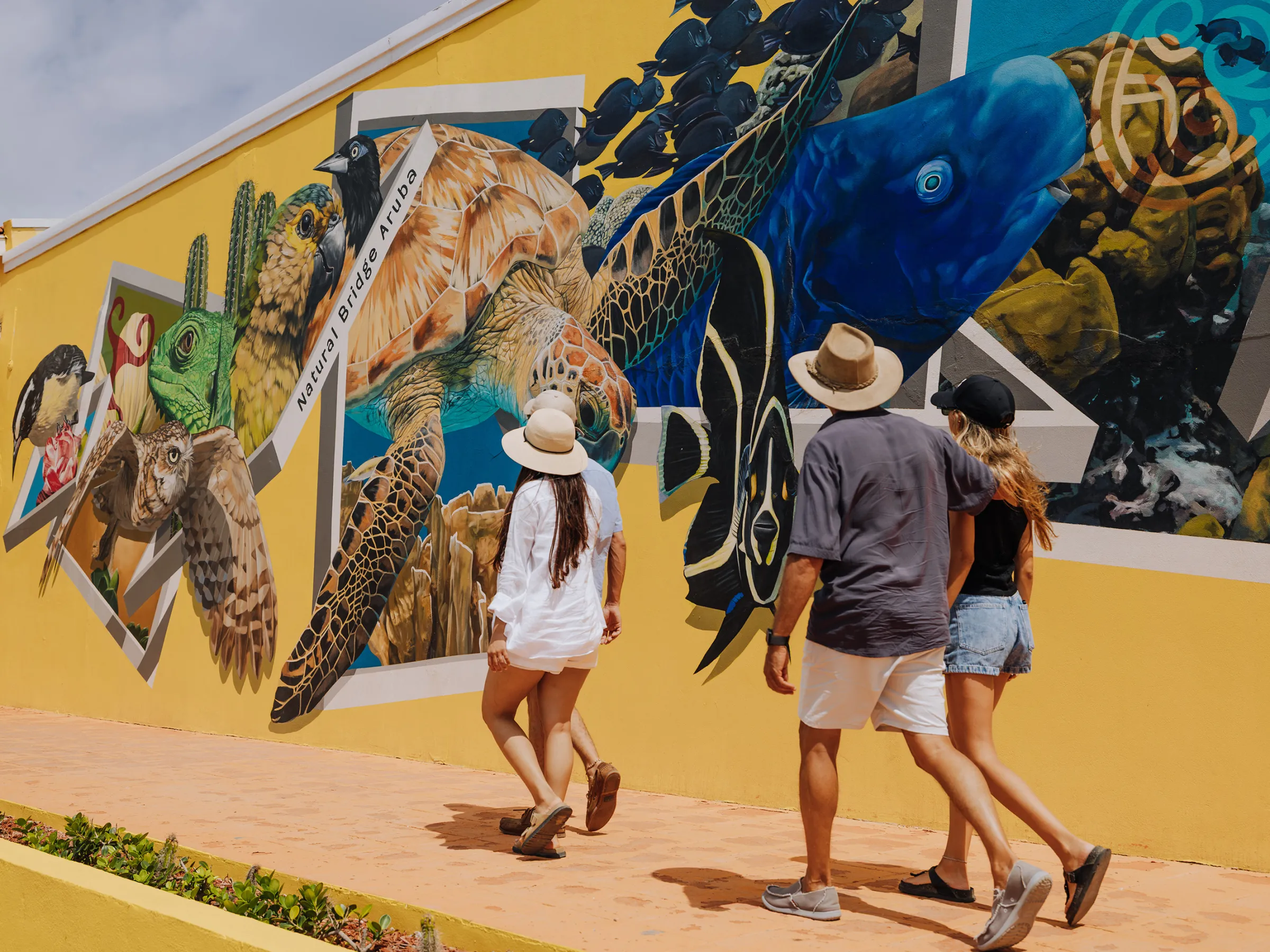 a group of people walking down a street