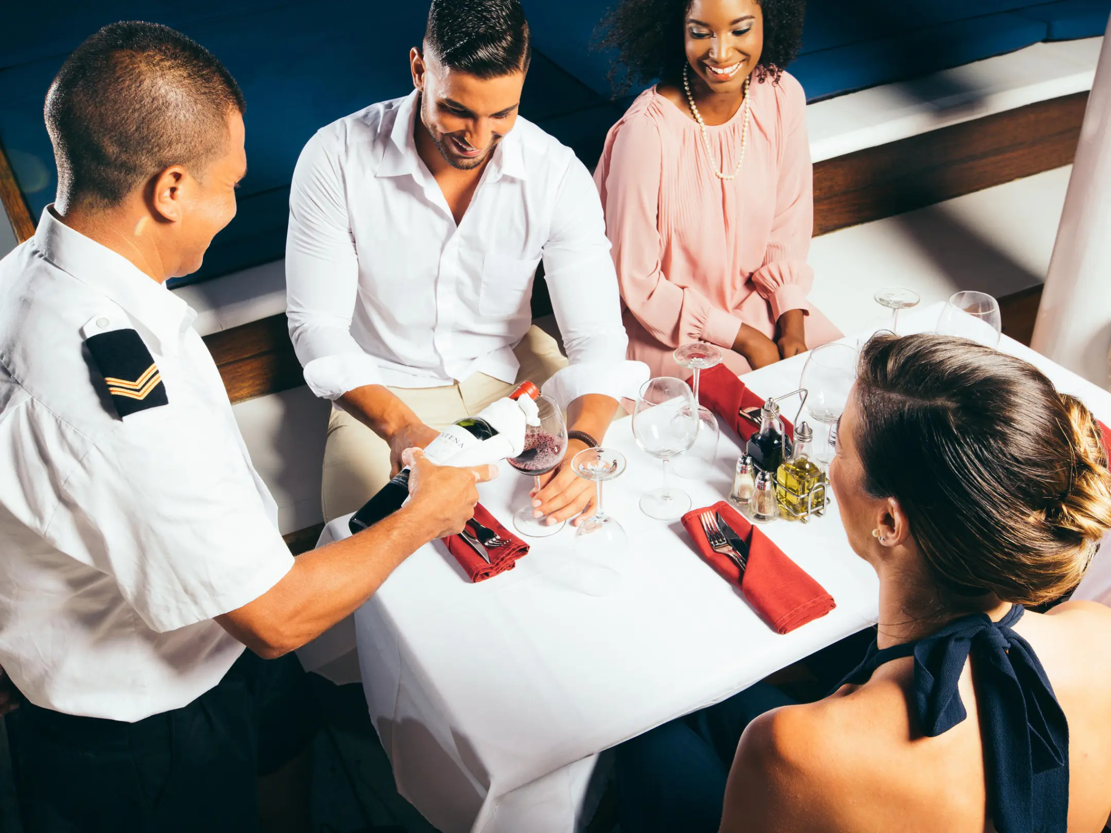 a man cutting a cake