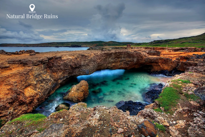 a rocky beach next to a body of water