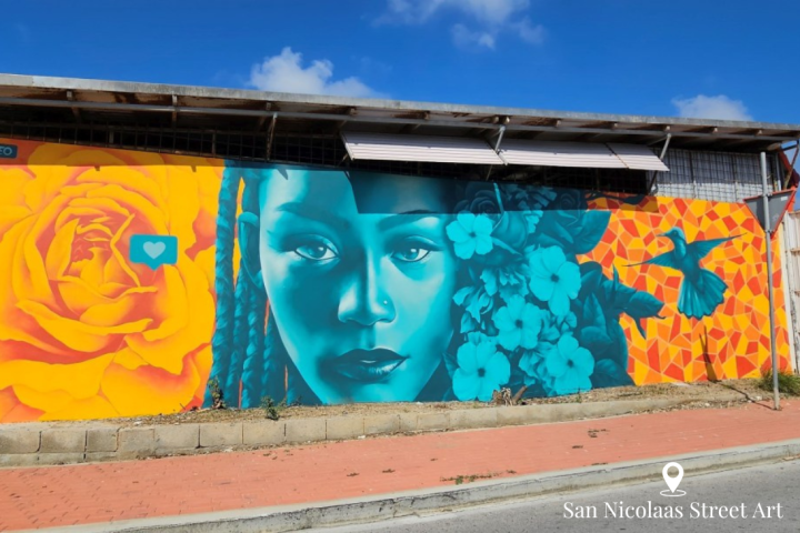 a painting of a person with graffiti on the side