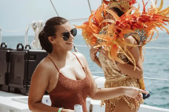 a woman standing on a beach