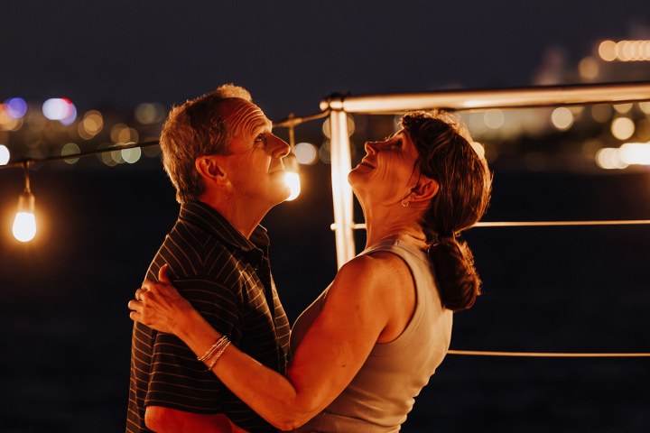 a man and a woman standing in a room