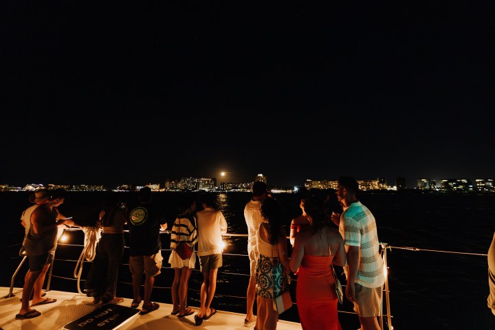 a group of people standing in front of a crowd