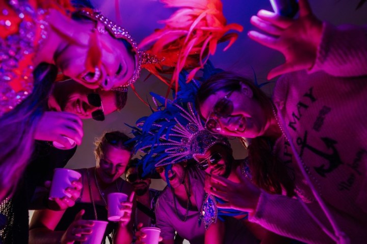 a vase of flowers on a stage