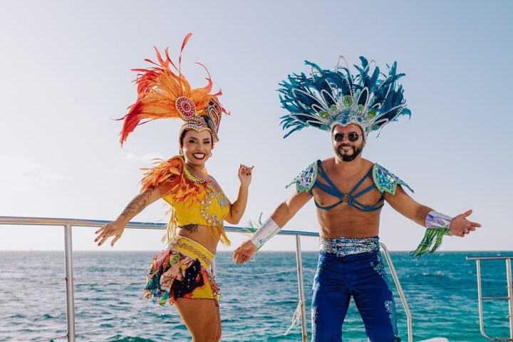 a group of people on a beach